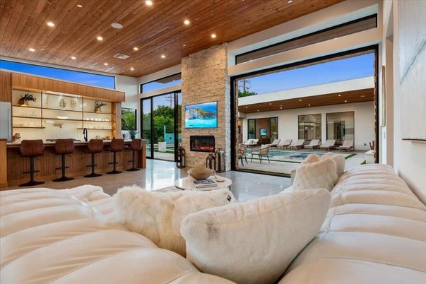 Fireplace, Interior, Living room, Recessed Lighting, Stone Walls, Wooden Ceilings