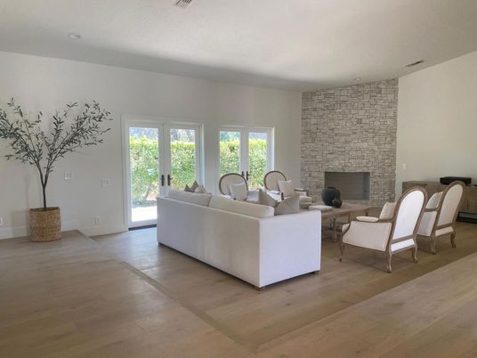 Fireplace, Interior, Living room, Recessed Lighting, Stone Walls, Wood Texture Flooring