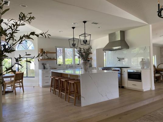 Dining room, Interior, Kitchen, Marble Walls, Pendant Lights, Recessed Lighting, Stainless Steel Appliances, Wood Texture Flooring