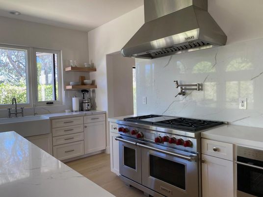 Interior, Kitchen, Marble Walls, Stainless Steel Appliances, Wood Texture Flooring