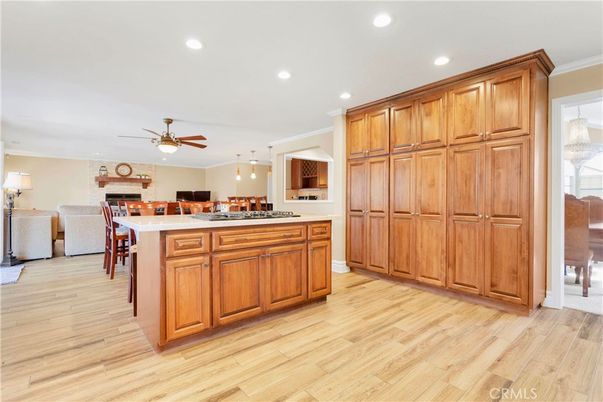 Dining room, Fireplace, Interior, Kitchen, Pendant Lights, Recessed Lighting, Wood Texture Flooring