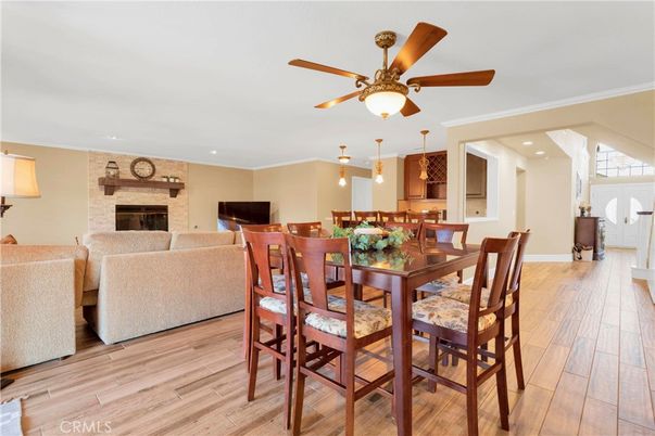 Dining room, Fireplace, Interior, Living room, Pendant Lights, Recessed Lighting, Stone Walls, Wood Texture Flooring