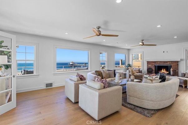 Fireplace, Interior, Living room, Recessed Lighting, Water, Wood Texture Flooring