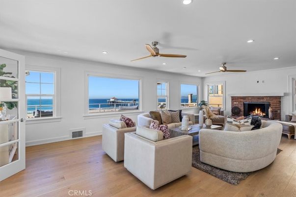 Fireplace, Interior, Living room, Recessed Lighting, Water, Wood Texture Flooring