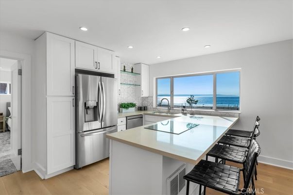 Interior, Kitchen, Recessed Lighting, Stainless Steel Appliances, Water, Wood Texture Flooring