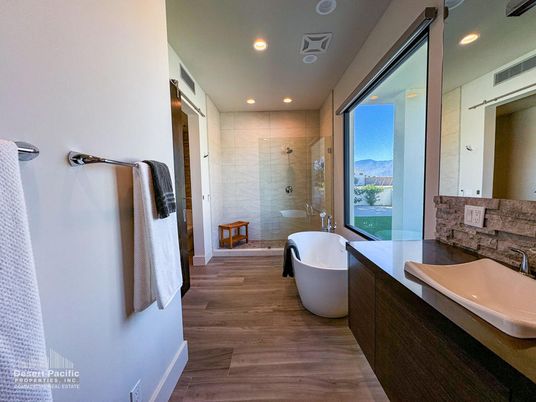 Bathroom, Free Standing Baths, Glass Shower, Interior, Recessed Lighting, Wood Texture Flooring
