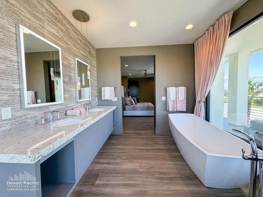 Bathroom, Dual Sink Vanities, Free Standing Baths, Interior, Pendant Lights, Recessed Lighting, Wood Texture Flooring
