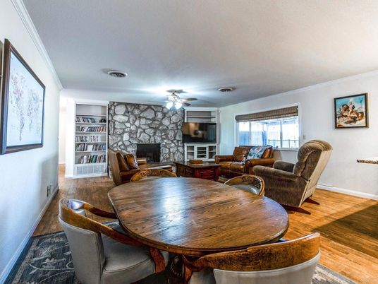 Dining room, Fireplace, Interior, Living room, Stone Walls, Wood Texture Flooring