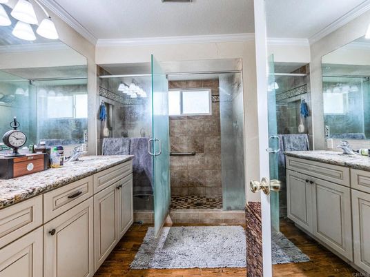 Bathroom, Dual Sink Vanities, Glass Shower, Interior, Wood Texture Flooring