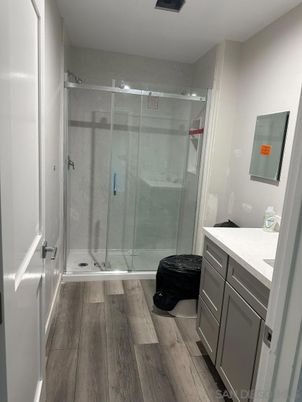 Bathroom, Glass Shower, Interior, Wood Texture Flooring
