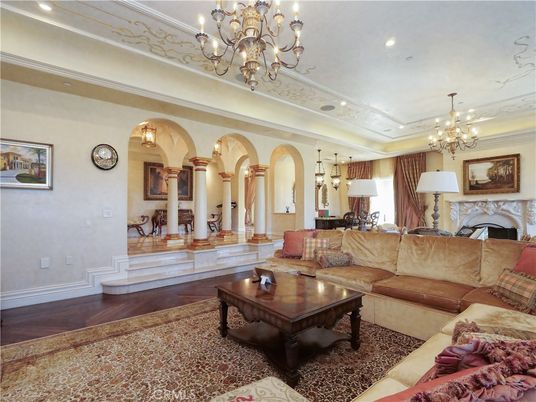 Chandelier, Fireplace, Interior, Living room, Recessed Lighting, Wood Texture Flooring
