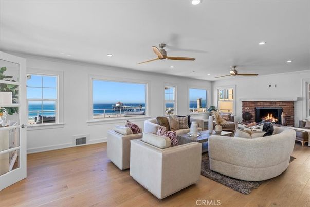 Fireplace, Interior, Living room, Recessed Lighting, Water, Wood Texture Flooring