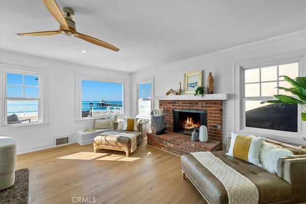 Fireplace, Interior, Living room, Recessed Lighting, Water, Wood Texture Flooring