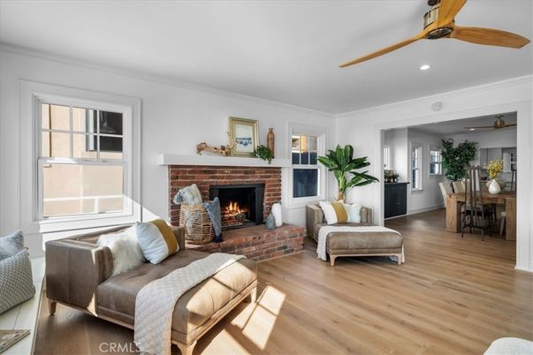 Dining room, Fireplace, Interior, Living room, Recessed Lighting, Wood Texture Flooring