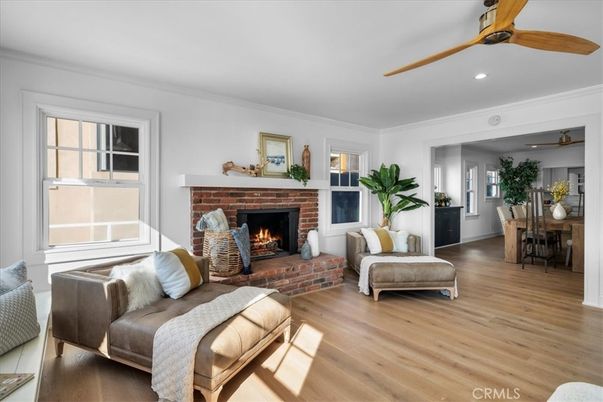Dining room, Fireplace, Interior, Living room, Recessed Lighting, Wood Texture Flooring
