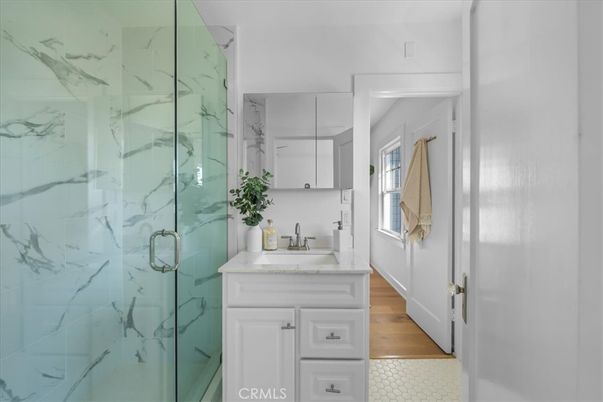 Bathroom, Glass Shower, Interior, Marble Walls, Wood Texture Flooring