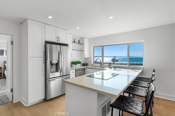 Interior, Kitchen, Recessed Lighting, Stainless Steel Appliances, Water, Wood Texture Flooring