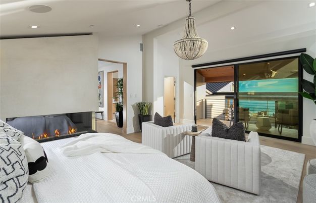Bedroom, Fireplace, Interior, Pendant Lights, Recessed Lighting, Wood Texture Flooring