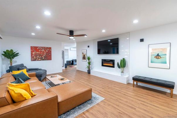 Fireplace, Interior, Living room, Recessed Lighting, Wood Texture Flooring