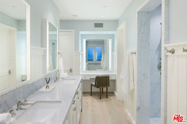 Bathroom, Dual Sink Vanities, Interior, Marble Walls, Recessed Lighting, Wood Texture Flooring