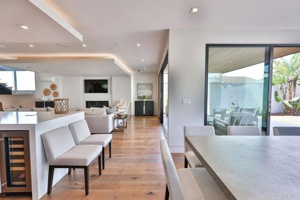 Dining room, Fireplace, Interior, Living room, Recessed Lighting, Wood Texture Flooring