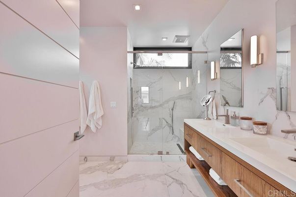 Bathroom, Dual Sink Vanities, Glass Shower, Interior, Marble, Marble Walls, Recessed Lighting