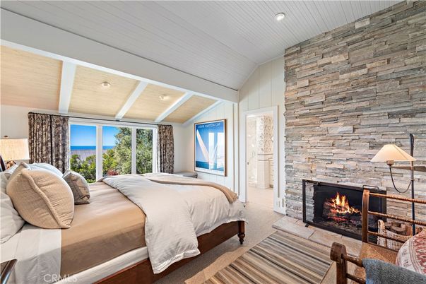 Bedroom, Fireplace, Interior, Recessed Lighting, Stone Walls, Water