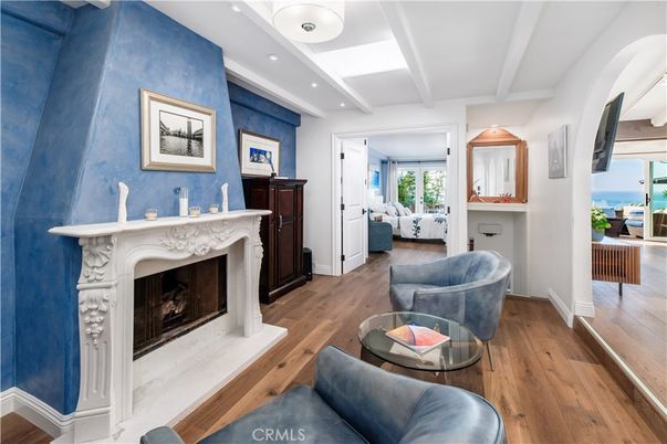 Fireplace, Interior, Living room, Recessed Lighting, Water, Wood Texture Flooring