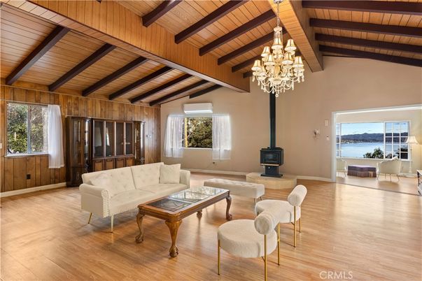 Chandelier, Fireplace, Interior, Living room, Water, Wooden Beams, Wooden Ceilings, Wood Texture Flooring