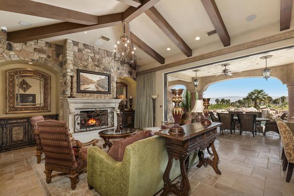 Chandelier, Dining room, Fireplace, Interior, Living room, Recessed Lighting, Stone Walls, Wooden Beams