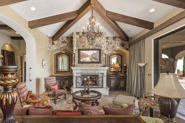 Chandelier, Fireplace, Interior, Living room, Recessed Lighting, Stone Walls, Wooden Beams