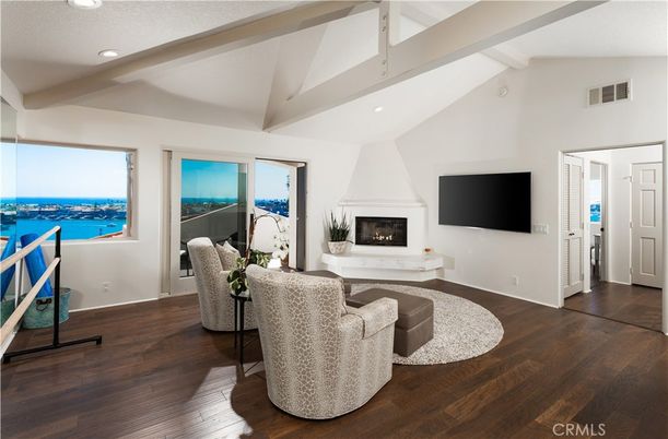Fireplace, Interior, Living room, Recessed Lighting, Water, Wood Texture Flooring