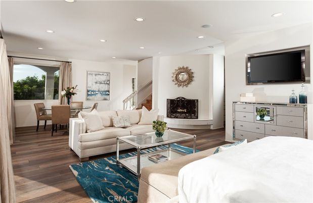 Dining room, Fireplace, Interior, Living room, Recessed Lighting, Wood Texture Flooring