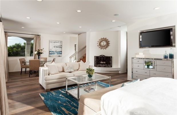 Dining room, Fireplace, Interior, Living room, Recessed Lighting, Wood Texture Flooring