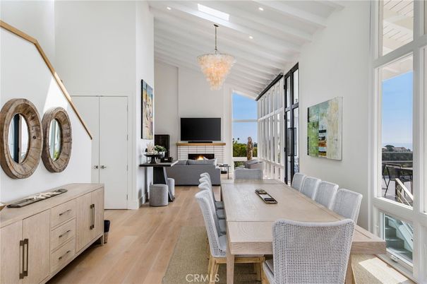 Chandelier, Dining room, Fireplace, Interior, Living room, Recessed Lighting, Wood Texture Flooring
