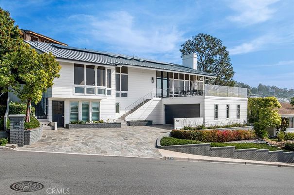 Exterior, Facade, Solar Panels, Raised Ranch