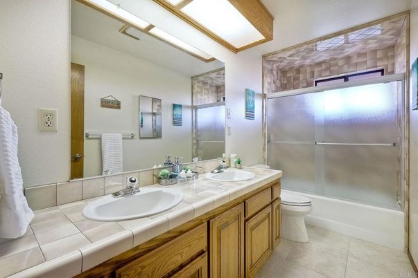 Bathroom, Dual Sink Vanities, Glass Shower, Interior, Tile Countertops