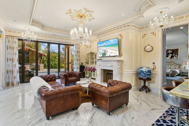 Chandelier, Fireplace, Interior, Living room, Marble, Recessed Lighting