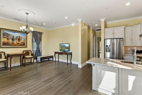Chandelier, Interior, Kitchen, Recessed Lighting, Stainless Steel Appliances, Wood Texture Flooring