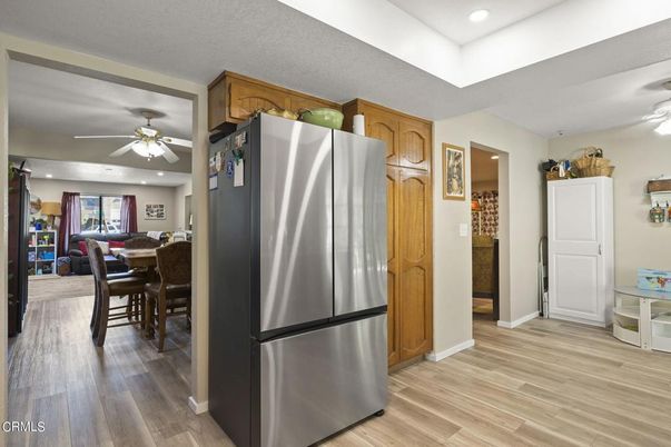 Dining room, Interior, Kitchen, Recessed Lighting, Stainless Steel Appliances, Wood Texture Flooring