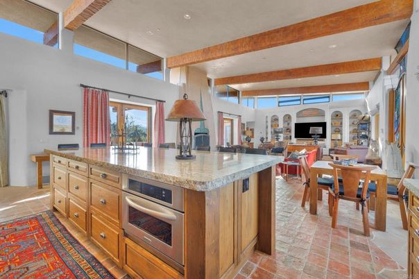 Dining room, Fireplace, Interior, Kitchen, Living room, Pendant Lights, Recessed Lighting, Stainless Steel Appliances, Wooden Beams