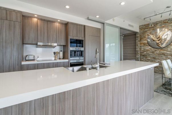 Interior, Kitchen, Recessed Lighting, Stainless Steel Appliances, Stone Walls