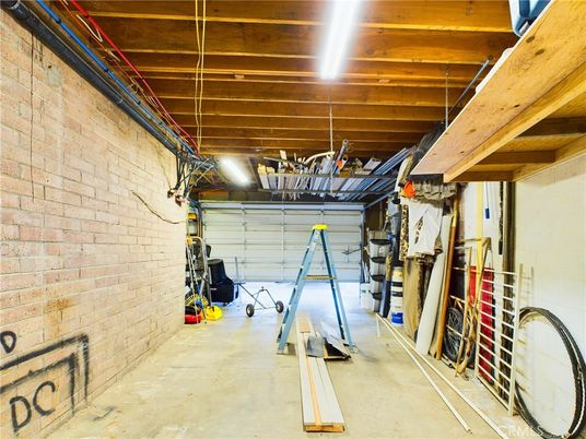 Garage, Interior, Stone Walls, Wooden Beams