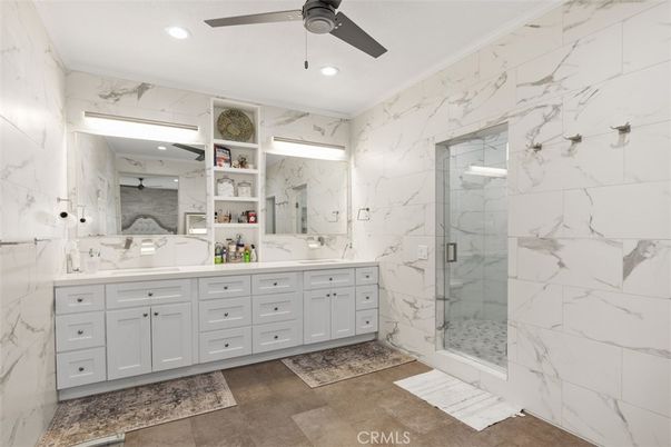 Bathroom, Dual Sink Vanities, Glass Shower, Interior, Marble Walls, Recessed Lighting