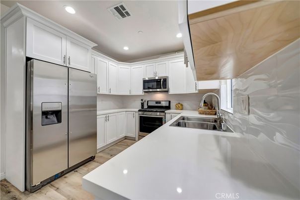 Interior, Kitchen, Recessed Lighting, Stainless Steel Appliances, Wood Texture Flooring