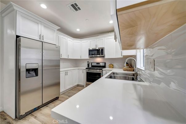 Interior, Kitchen, Recessed Lighting, Stainless Steel Appliances, Wood Texture Flooring