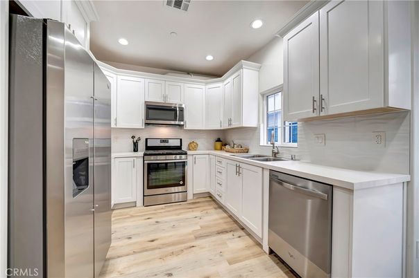 Interior, Kitchen, Recessed Lighting, Stainless Steel Appliances, Wood Texture Flooring
