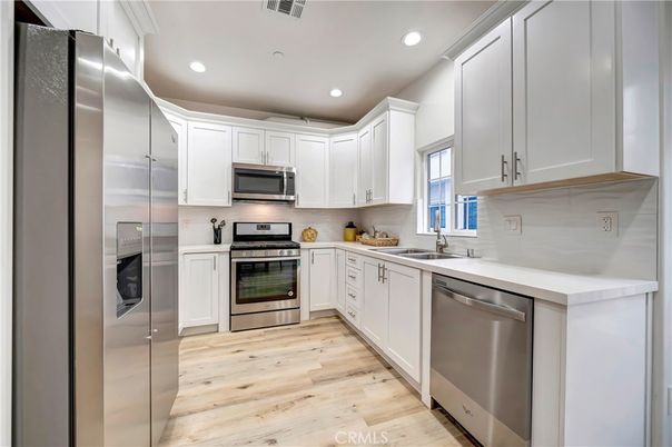 Interior, Kitchen, Recessed Lighting, Stainless Steel Appliances, Wood Texture Flooring
