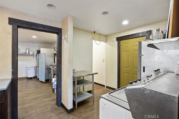 Interior, Kitchen, Recessed Lighting, Washer, Wood Texture Flooring