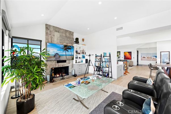 Fireplace, Interior, Living room, Recessed Lighting, Stone Walls, Wood Texture Flooring
